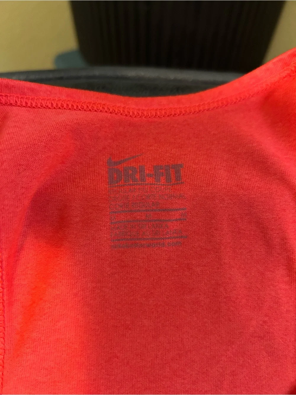 Nike Women’s Neon Coral Tank with Multicolor Athletic Shorts